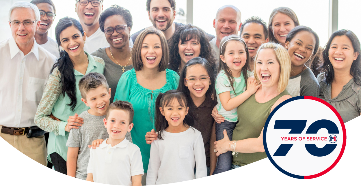 Group of happy people with 70 year anniversary logo