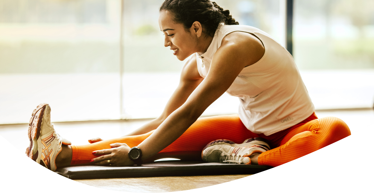 woman stretching before workout