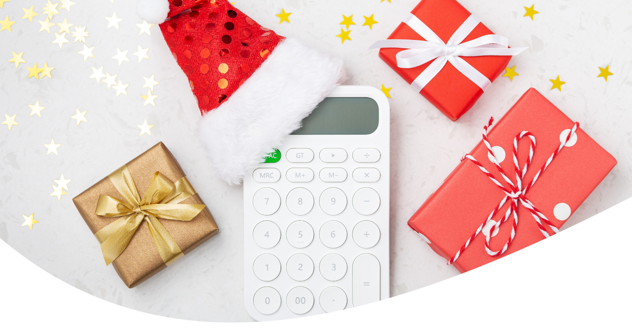 holiday boxes with confetti and calculator