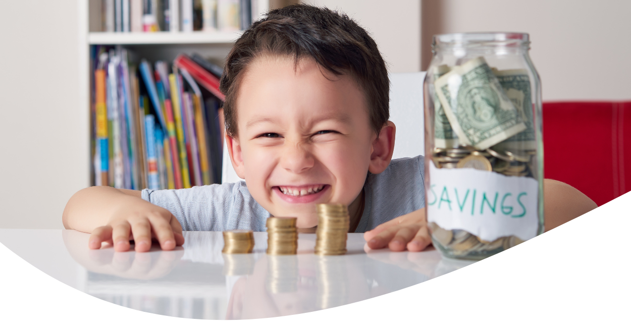 boy with savings jar