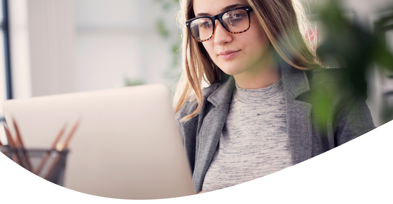 young adult working on laptop