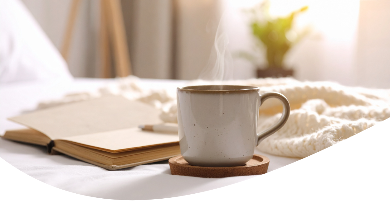 hot cozy beverage with notebook