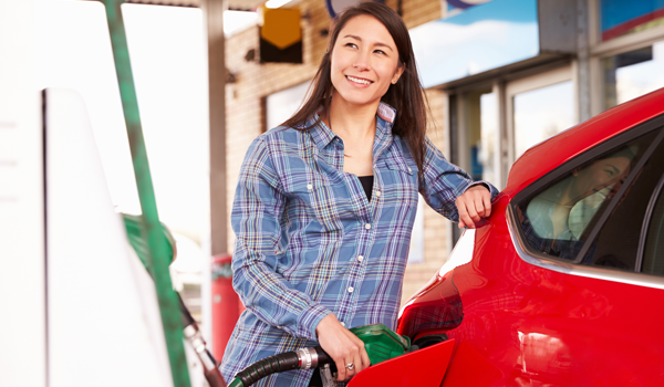 woman pumping gas