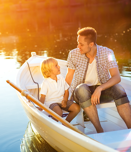 Father and son in rowboat