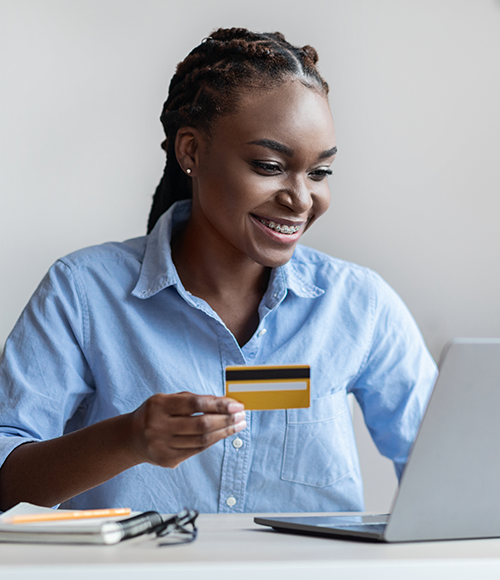 Woman holding credit card