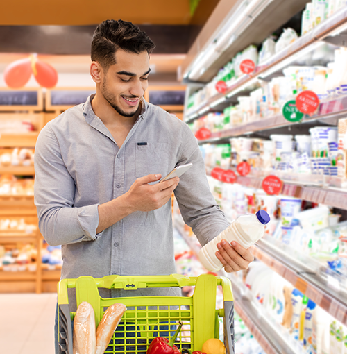 Young man shopping for groceries