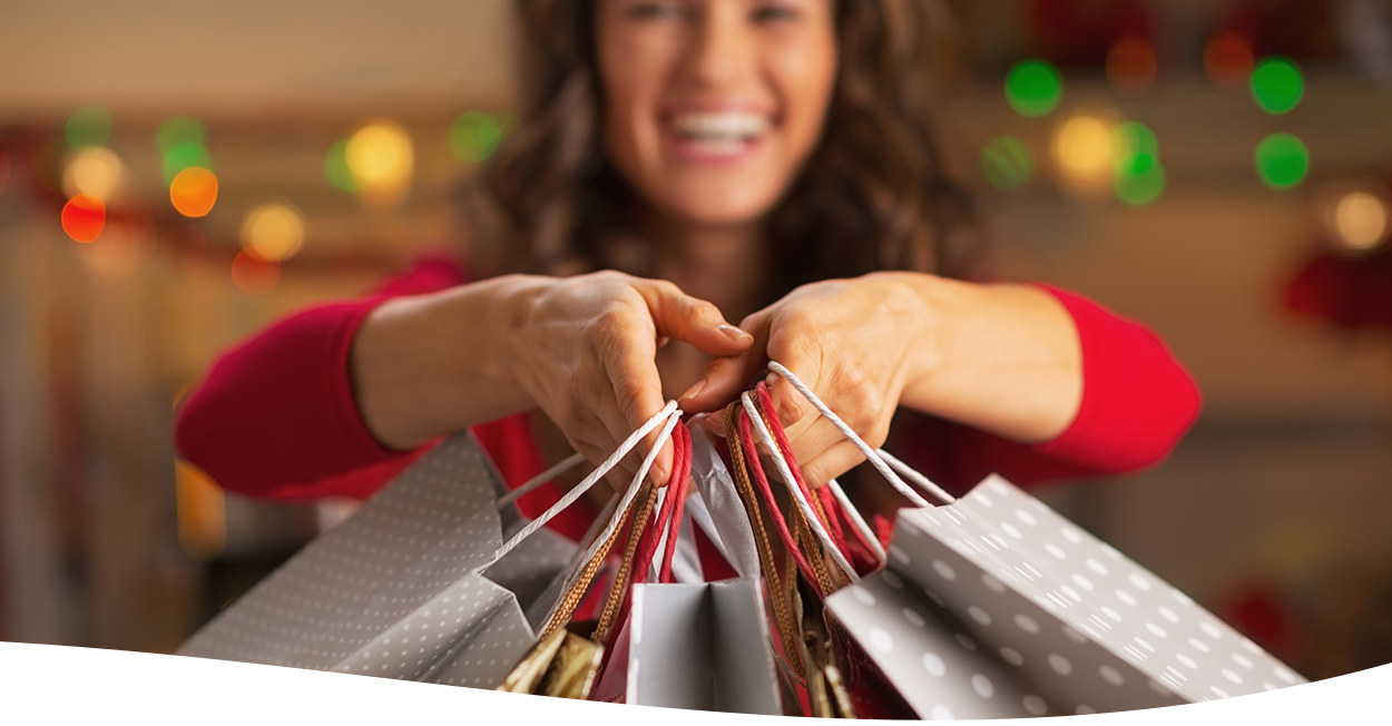 woman holding gift bags