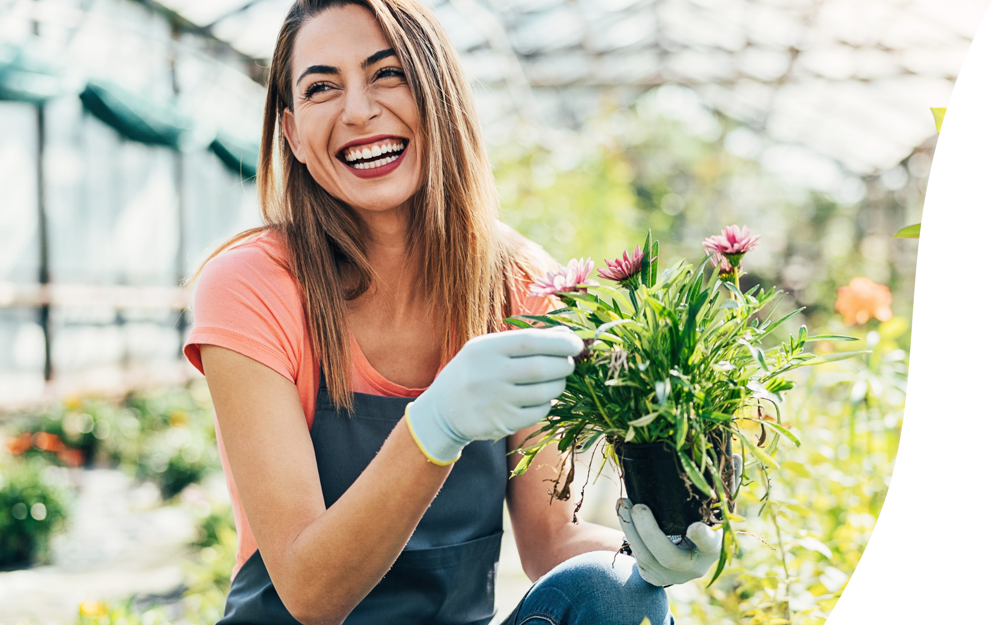 woman gardening in greenhouse