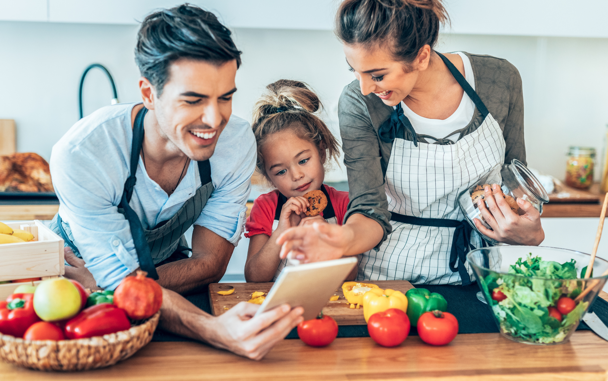 family cooking in kitchen