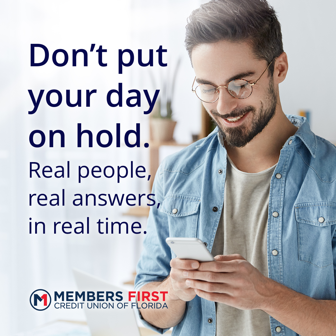 Young adult male looking at cell phone